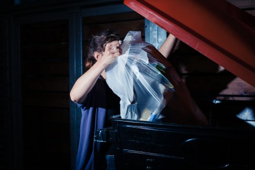 Trucks transporting cleared items in Hoxton